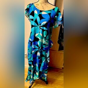 Avenue dress worn once. Size 14/16. Asymmetrical ruffles hem.